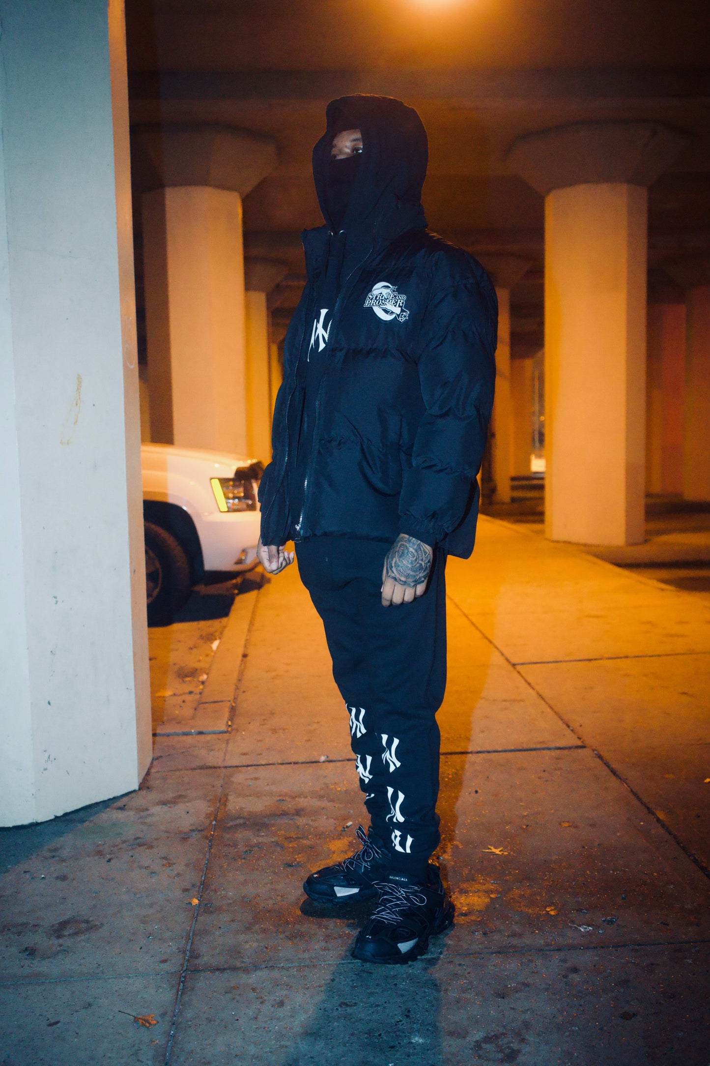 STRIVE AND PROSPER PUFFER COAT